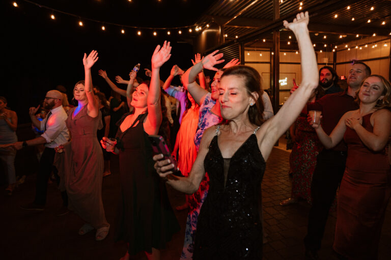 DJ in Mesa AZ on the dance floor inside the willow event venue at the venue Lexi Wyatt photography